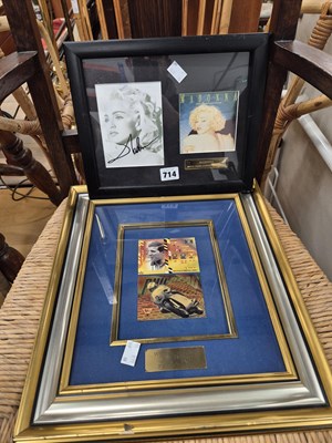 Lot 714 - A framed signed photograph of Madonna and a...