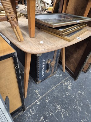 Lot 718 - An Ercol pale elm dining table. H 72 L 154 W...