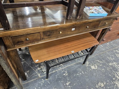 Lot 722 - A mahogany three drawer writing table.