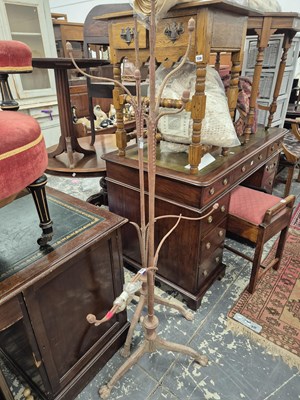 Lot 728 - A Pair of antique wrought and cast iron hat...