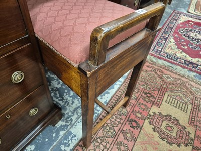 Lot 733 - A piano stool.