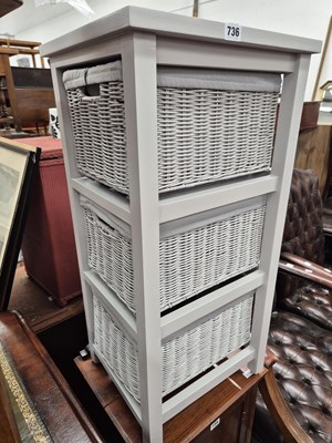 Lot 736 - A nest of rattan drawers.