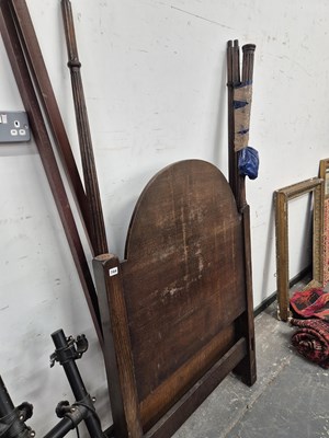 Lot 744 - An oak four poster single bed frame.