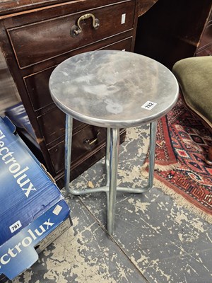 Lot 762 - An alloy and chrome stool.