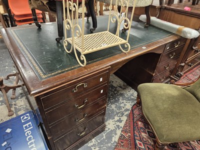 Lot 764 - A large mahogany partners desk.