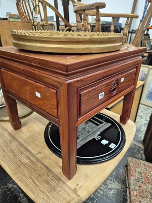 Lot 772 - An oriental hardwood low side table.