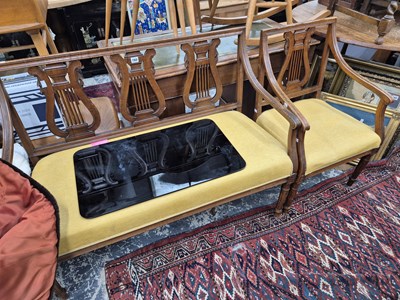 Lot 780 - A french walnut salon settee with triple lyre...