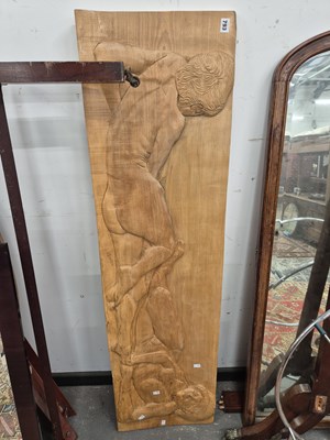 Lot 793 - A carved hardwood panel.