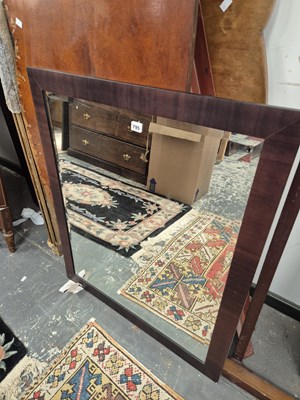 Lot 795 - a wall mirror.