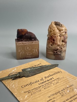 Lot 370 - Two carved oriental hardstone seals together...