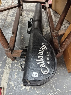 Lot 804 - A bag of golf clubs.