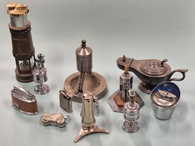 Lot 374 - A collection of lighters etc.