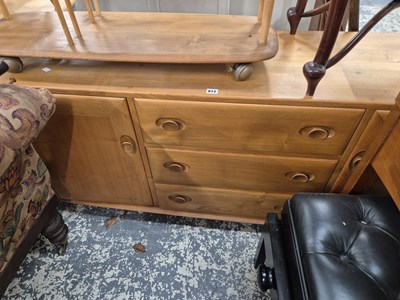 Lot 812 - An Ercol pale elm sideboard. H 69 W 156 D 46cms