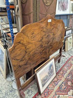 Lot 815 - A walnut double bed , head and footboard.