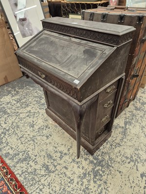 Lot 817 - An Edwardian davenport desk.