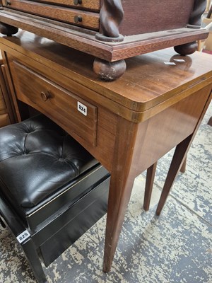 Lot 824 - A sewing machine table.