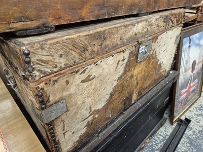 Lot 835 - An antique Full hide covered wooden trunk/ box.