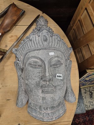 Lot 844 - A large pottery wall mask of a thai goddess.