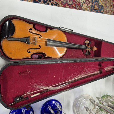 Lot 352 - A wooden-cased Breton violin with a bow....