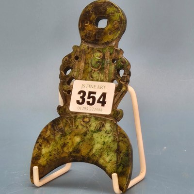 Lot 354 - A Chinese green stone plaque pierced and...