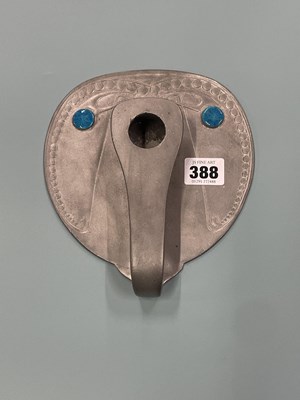 Lot 388 - A pewter chamber stick by Archibald Knox for...