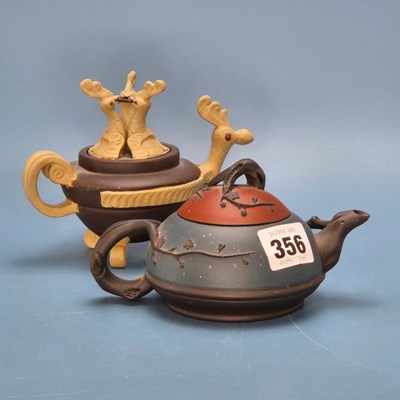 Lot 356 - Two Yixing coloured ware tea pots, one with a...