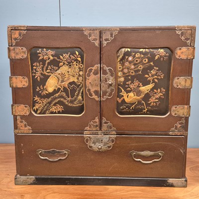Lot 365 - A Japanese brown lacquer table top cabinet,a...