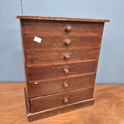 Lot 367 - A stained pine collector's table top chest of...