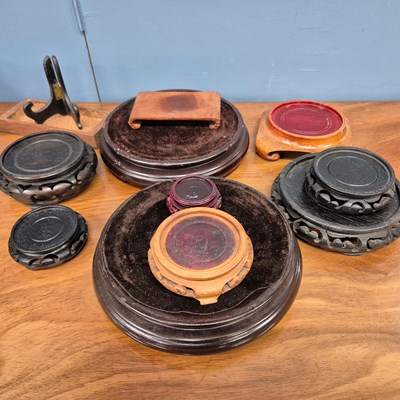 Lot 370 - A collection of Chinese hardwood vase stands