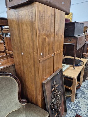 Lot 856 - A walnut veneer. mid century wardrobe.