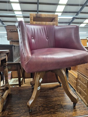 Lot 870 - A swivel office chair.