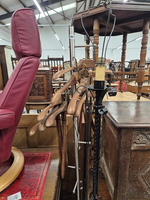 Lot 881 - A stainless steel coat stand, various cloak...