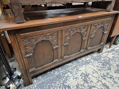 Lot 884 - An antique oak coffer with arch panel front.