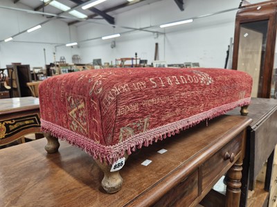 Lot 886 - An upholstered long fender stool on short...