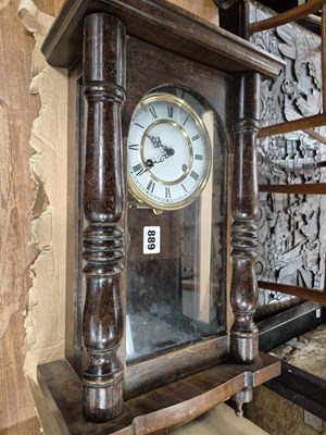 Lot 889 - A small mahogany cased vienna type wall clock.