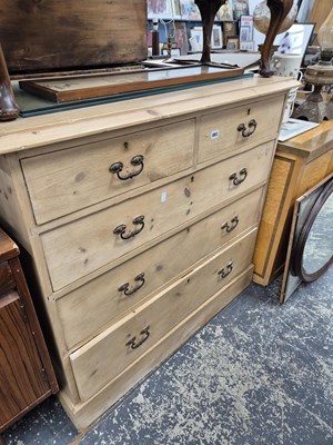Lot 893 - An antique pine chest of five drawers.