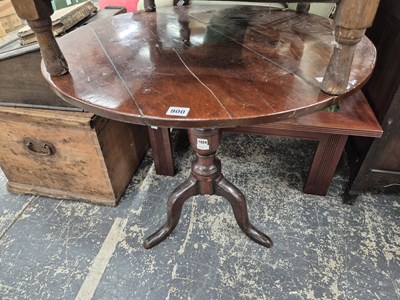 Lot 900 - A 19th century yew wood tripod table. Diameter...