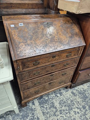 Lot 903 - A burr walnut bureau in the Georgian manner.