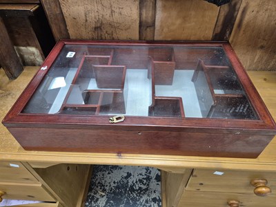 Lot 914 - An oriental hardwood display cabinet.