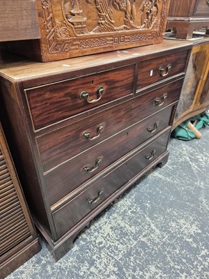 Lot 925 - A Georgian mahogany caddy top chest of drawers.