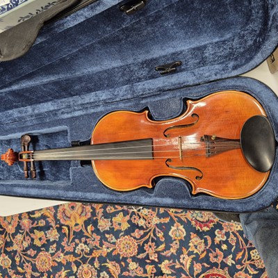 Lot 373 - A canvas cased violin labelled for Evasio...