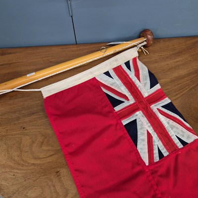 Lot 375 - A sewn red ensign for a motor launch, the flag...