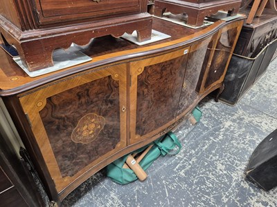 Lot 928 - A Mohogany and inlaid serpentine front sideboard.