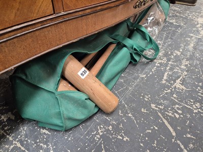Lot 930 - A croquet set.