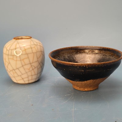 Lot 376 - A Henan glazed bowl, the interior emblazonned...