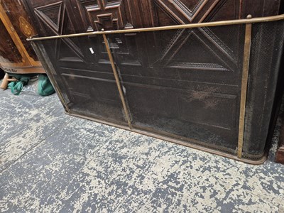 Lot 934 - A brass rail top fireguard. H 56 W 132 D 49cms
