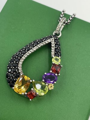 Lot 302 - A silver, black and white CZ  open work...