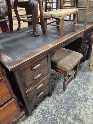 Lot 940 - An oak pedestal desk.