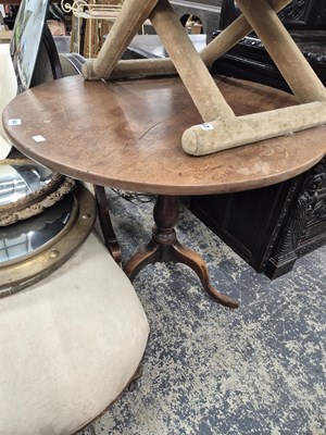 Lot 944 - An early 19th century mahogany tilt top tripod...