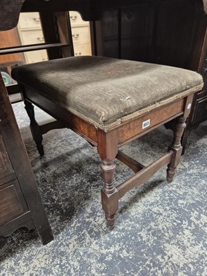 Lot 953 - An antique walnut music stool with rising top...